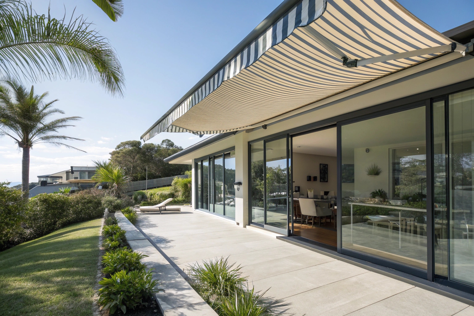 Professional awning installation on Sunshine Coast home providing shade and energy efficiency