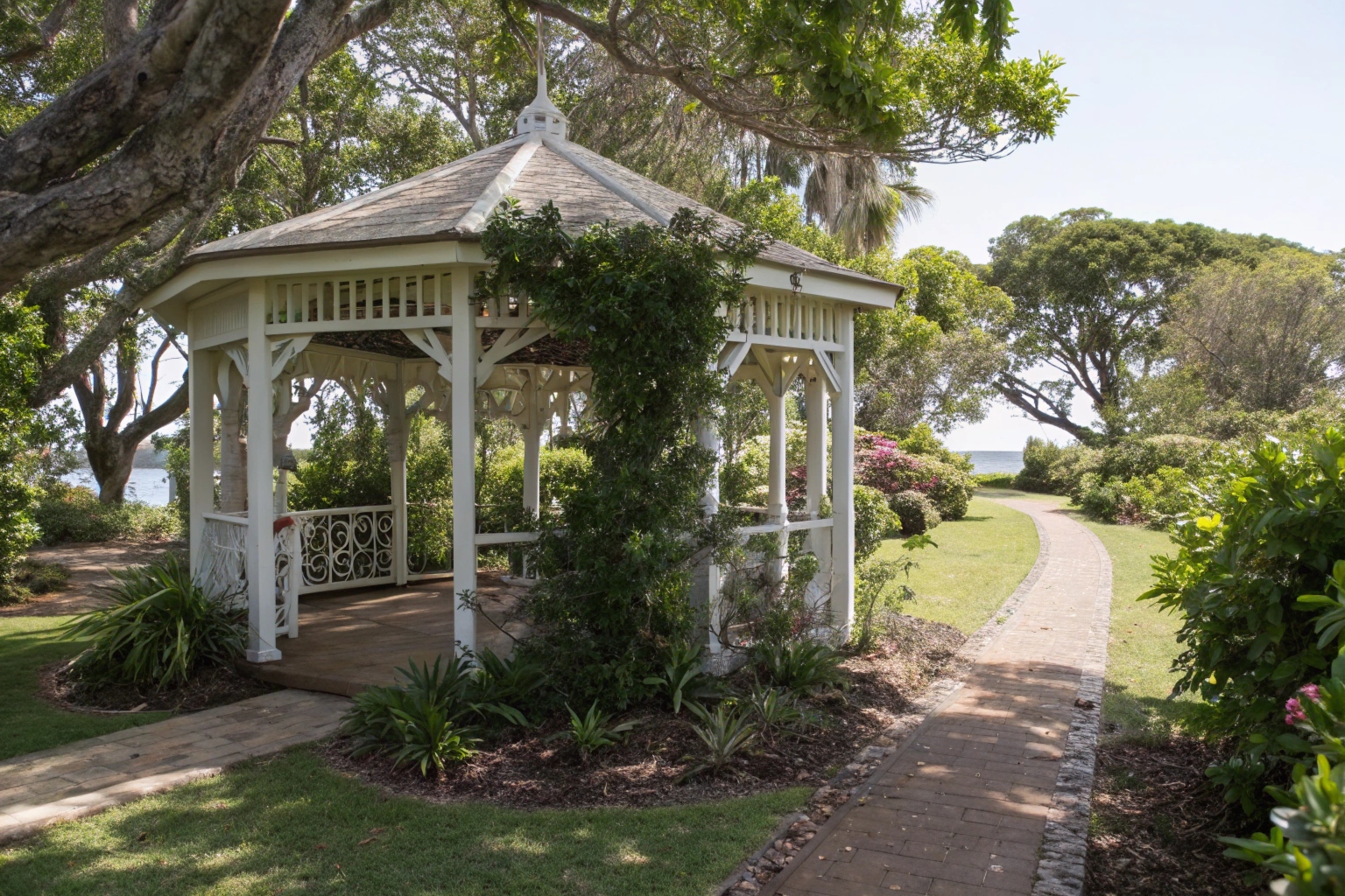 Garden gazebo with climbing plants in established Sunshine Coast landscape